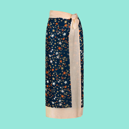 Navy blue skirt with star pattern and beige accents on a white background