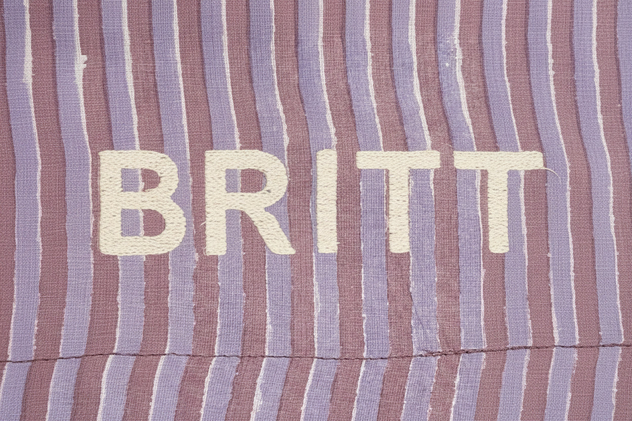 Striped fabric with floral patterns at the top and bottom