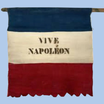 A vintage fabric banner or flag featuring the blue, white, and red horizontal tricolor of the French flag, with 'VIVE NAPOLEON' printed in black stencil text across the center. The flag is shown hanging from a wooden dowel against a plain white background.